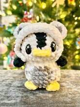 Load image into Gallery viewer, Northern Lights the Penguin in a Polar Bear Onesie